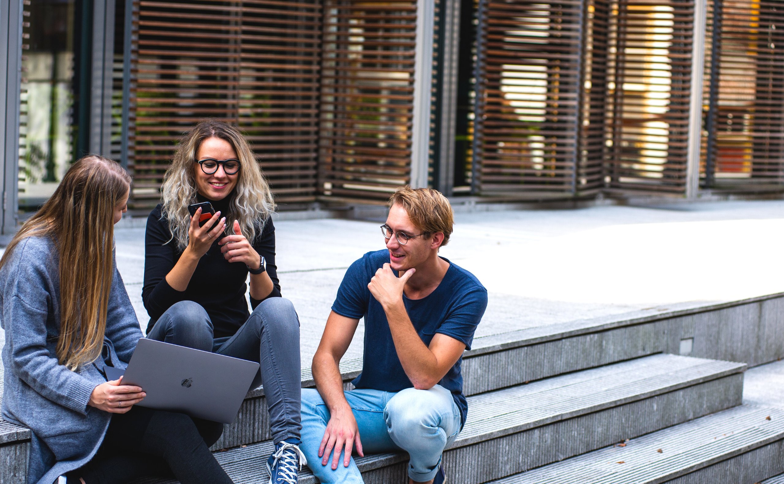Technology consultants reviewing work together